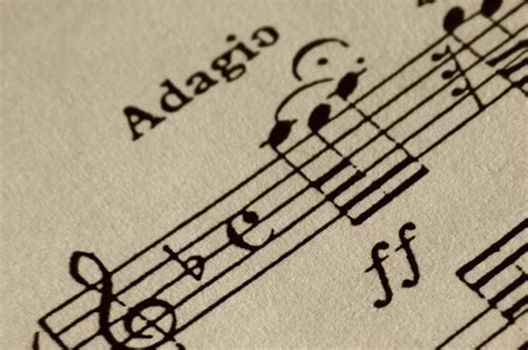 What Does Adagio Mean in Music: An Examination of Its Various Interpretations and Emotions